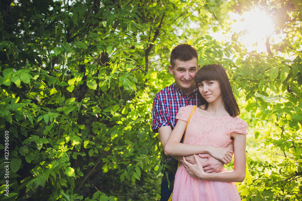 young couple in love together on nature young couple in love together on nature