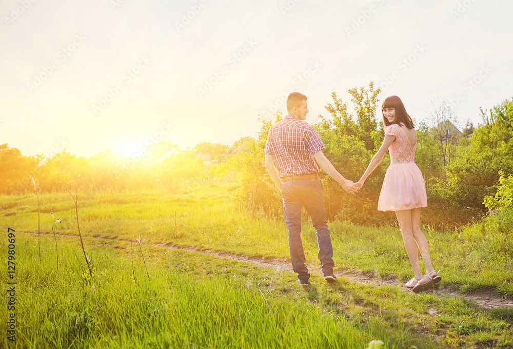 young couple in love together on nature