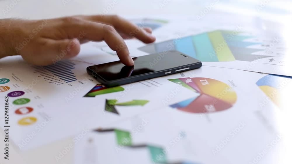 Businessman working with statistics Businessman working with statistics