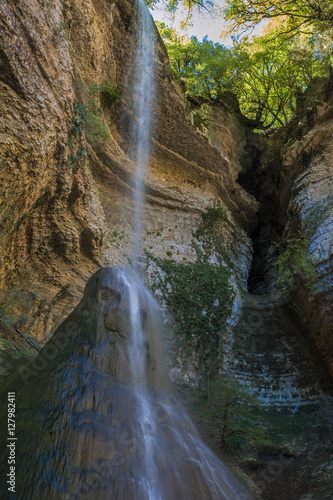 Shakuranskiy waterfall in green tropical forest in Abkhazia.