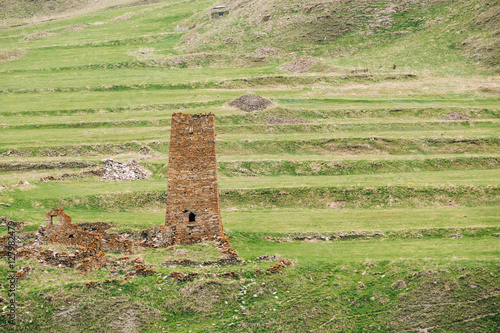 Ancient Old Stone Watchtower On Mountain Background In Chetoyta  photo