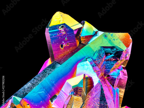 Extreme sharp Titanium rainbow aura quartz crystal cluster stone on black background