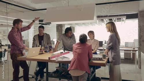 Multiethnic Team of Architects Working Together
