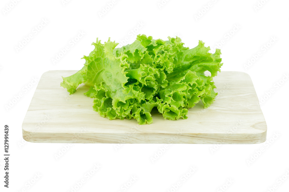 Salad leaf. Lettuce isolated on wooden cutting board isolated on Salad leaf. Lettuce isolated on wooden cutting board isolated on