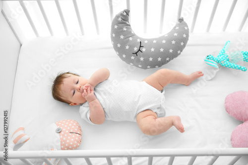 Cute baby in bed