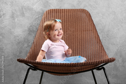 Little fashion-girl sitting...