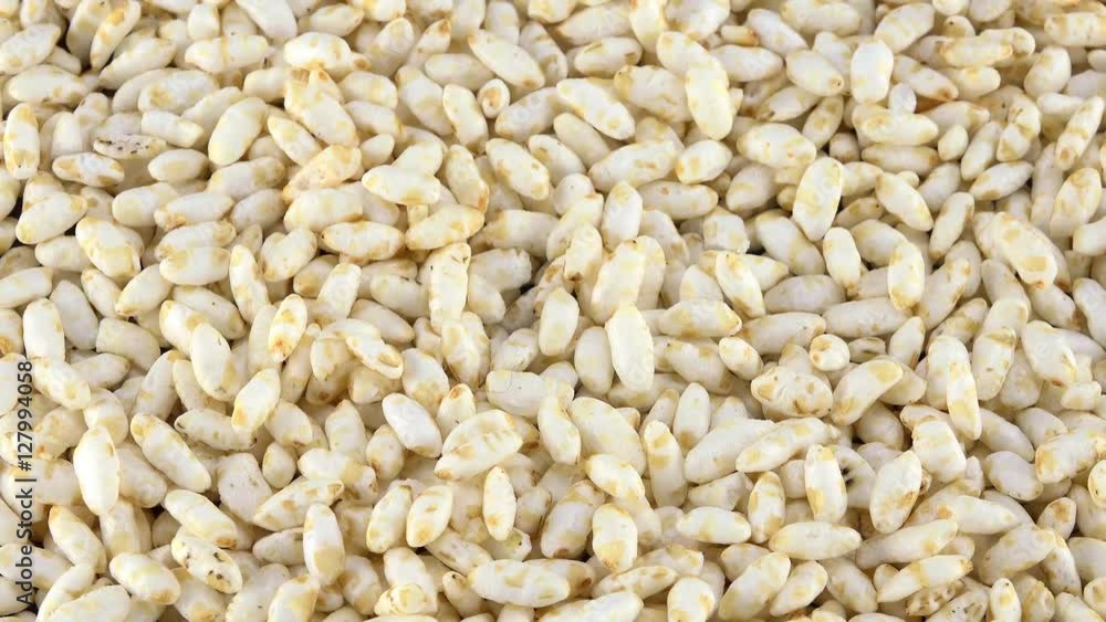 Portion of puffed Rice (rotating) as not loopable 4K UHD footage Portion of puffed Rice (rotating) as not loopable 4K UHD footage