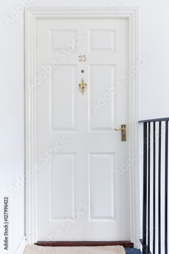 Retro white closed wooden entrance door 23