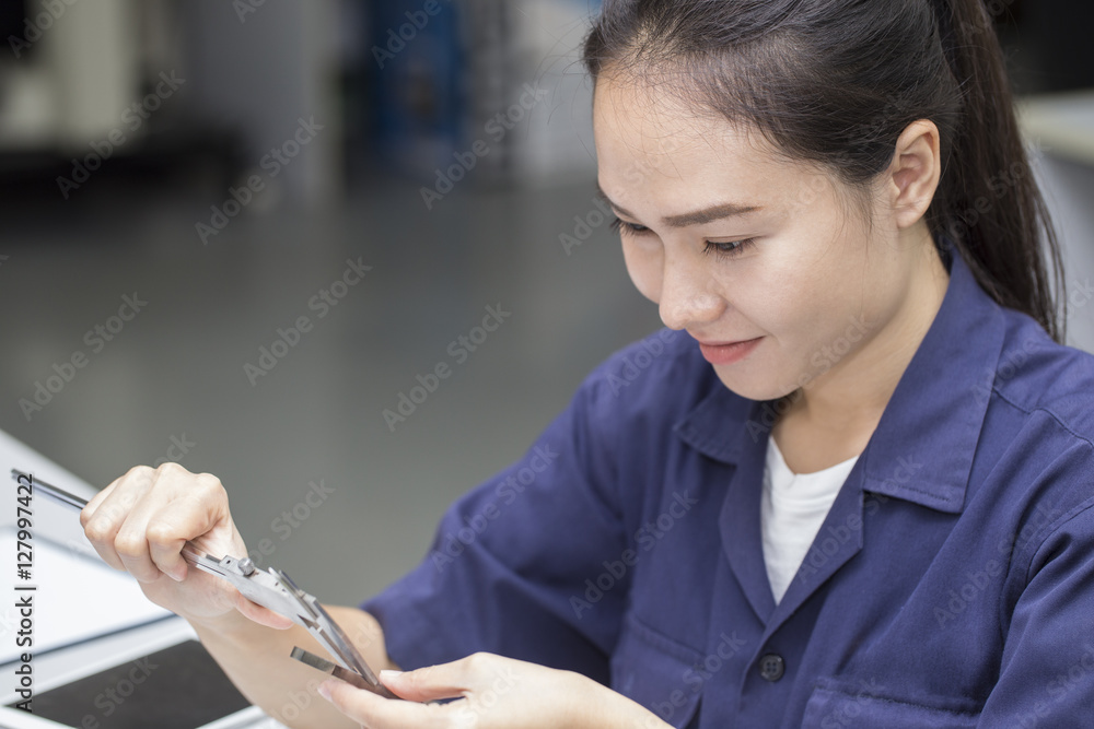 young engineer using vernier in the laboratory young engineer using vernier in the laboratory