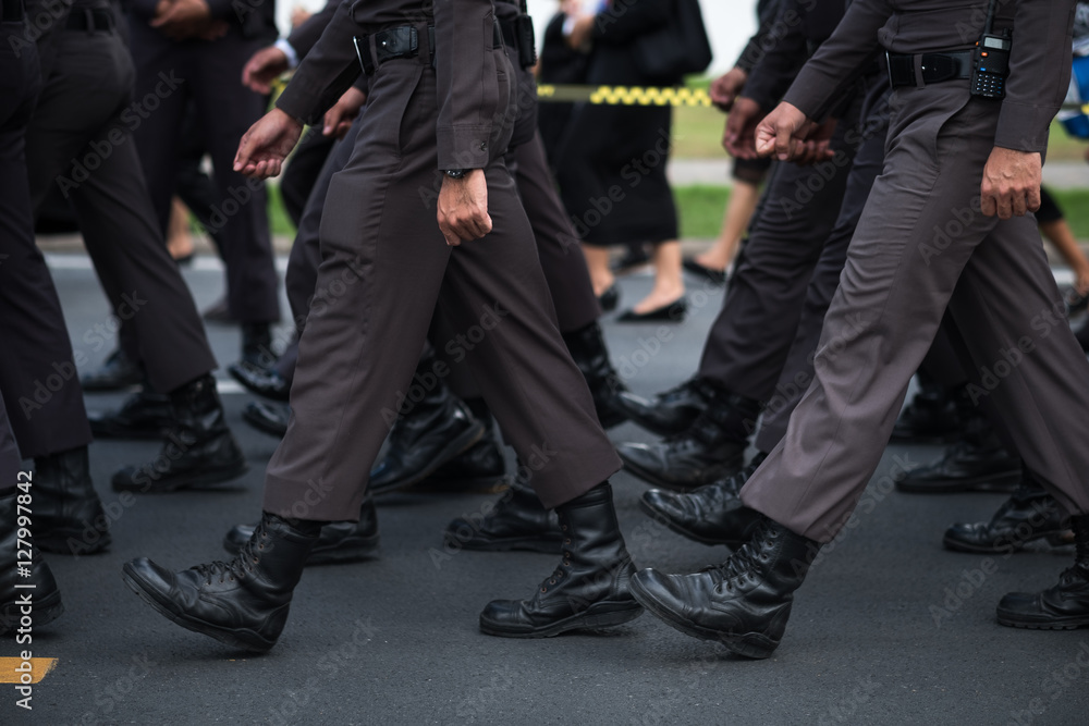 Police walking in row