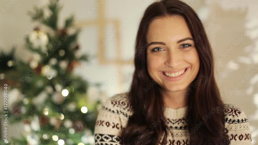 Close up woman portrait posing on tree lights background. , christmas holiday concept, happy and emotions Close up woman portrait posing on tree lights background. , christmas holiday concept, happy and emotions