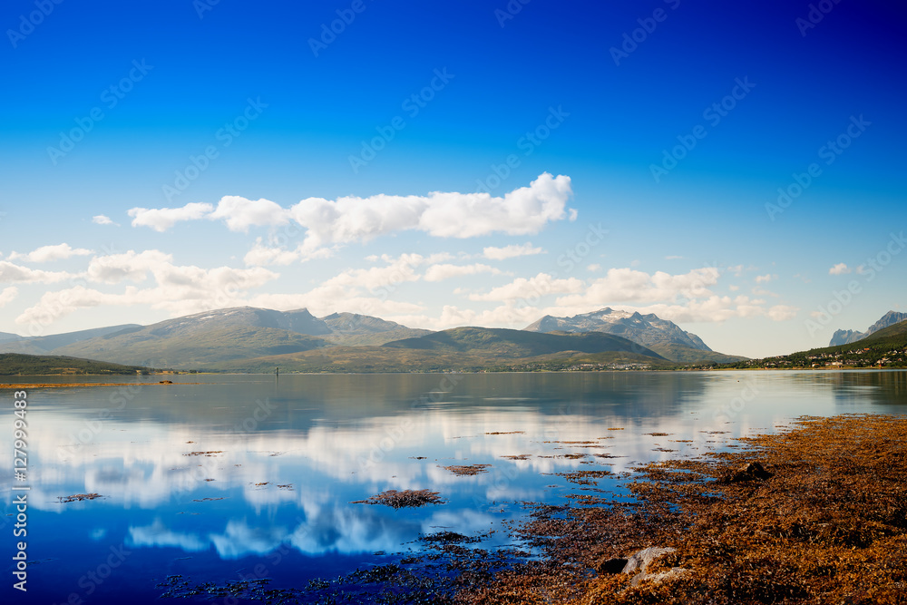 Fototapeta premium Norway hills with clouds reflection landscape