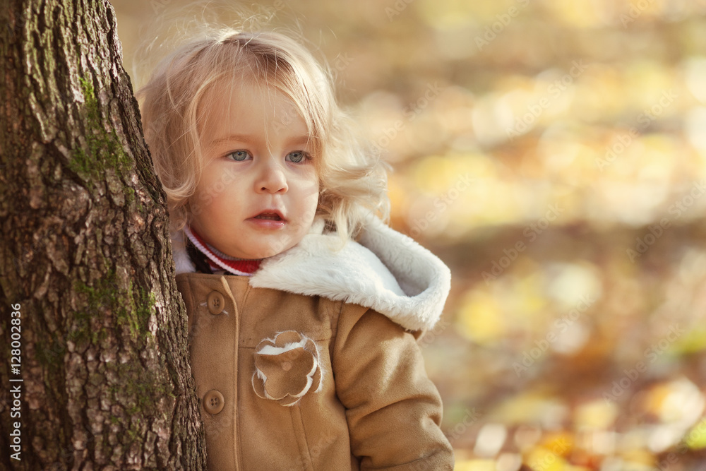 Portrait of pretty thoughtful girl in autumn park Portrait of pretty thoughtful girl in autumn park