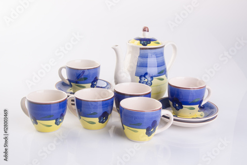 tea set or antique porcelain tea set on background.