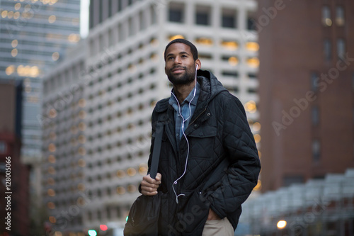 Photography African American man en route to work in the city