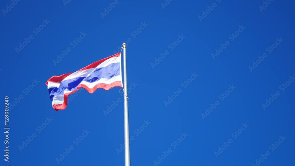 Flag of Thailand waving with blue sky background Flag of Thailand waving with blue sky background
