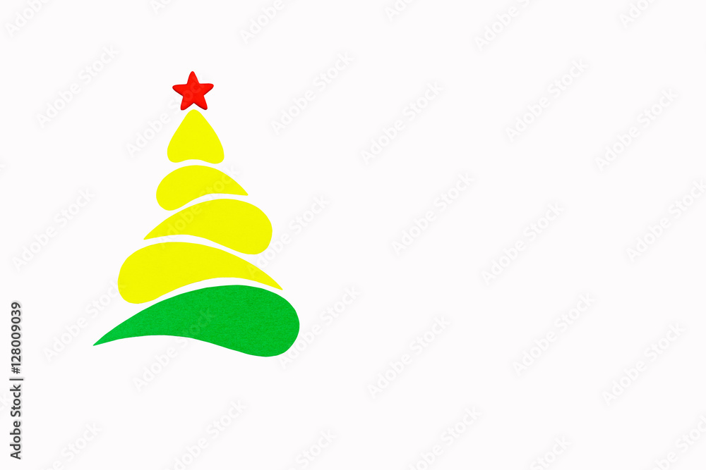 The New Year and Christmas conceptual tree made of a color cardboard. Isolated on a white background. The New Year and Christmas conceptual tree made of a color cardboard. Isolated on a white background.