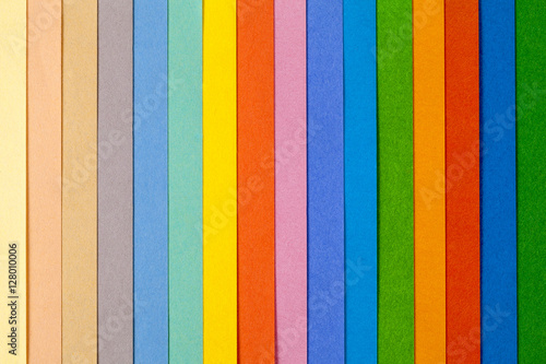 Background of colorful paper parallel vertical stripes