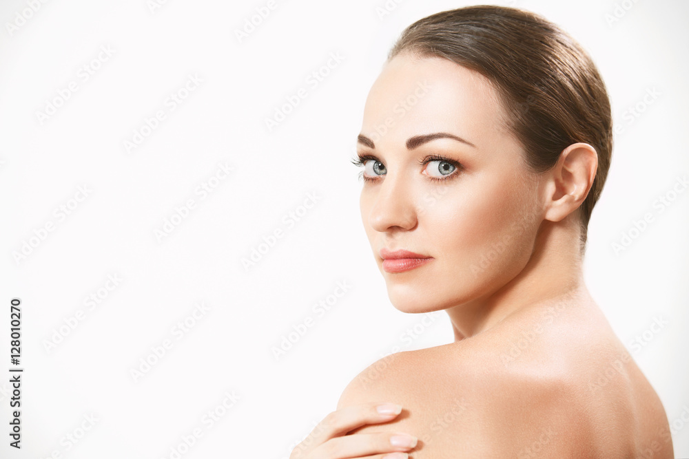 Beautiful face of young adult woman with clean fresh skin. Beautiful face of young adult woman with clean fresh skin.