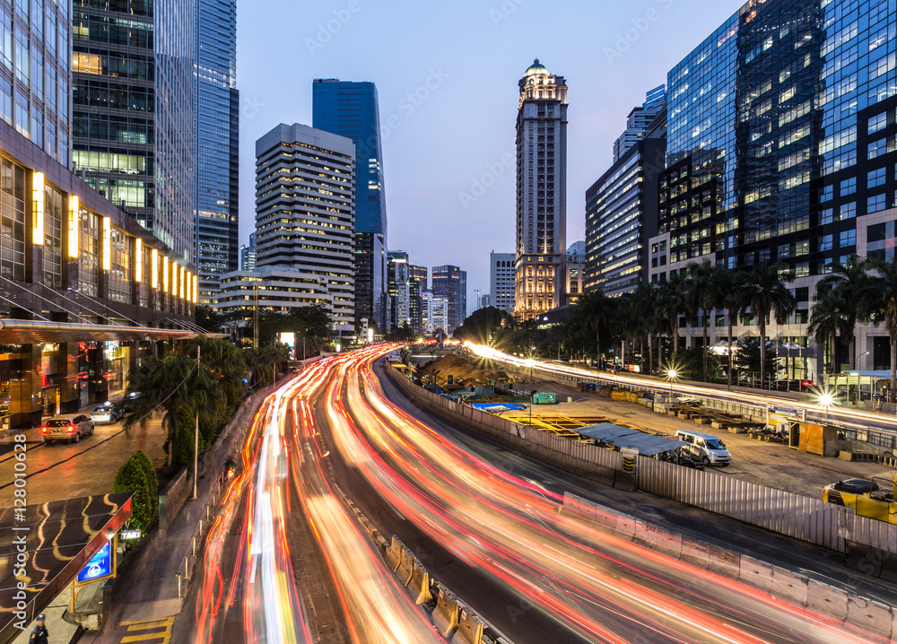 Jakarta rush hour in business district in Indonesia capital city at night