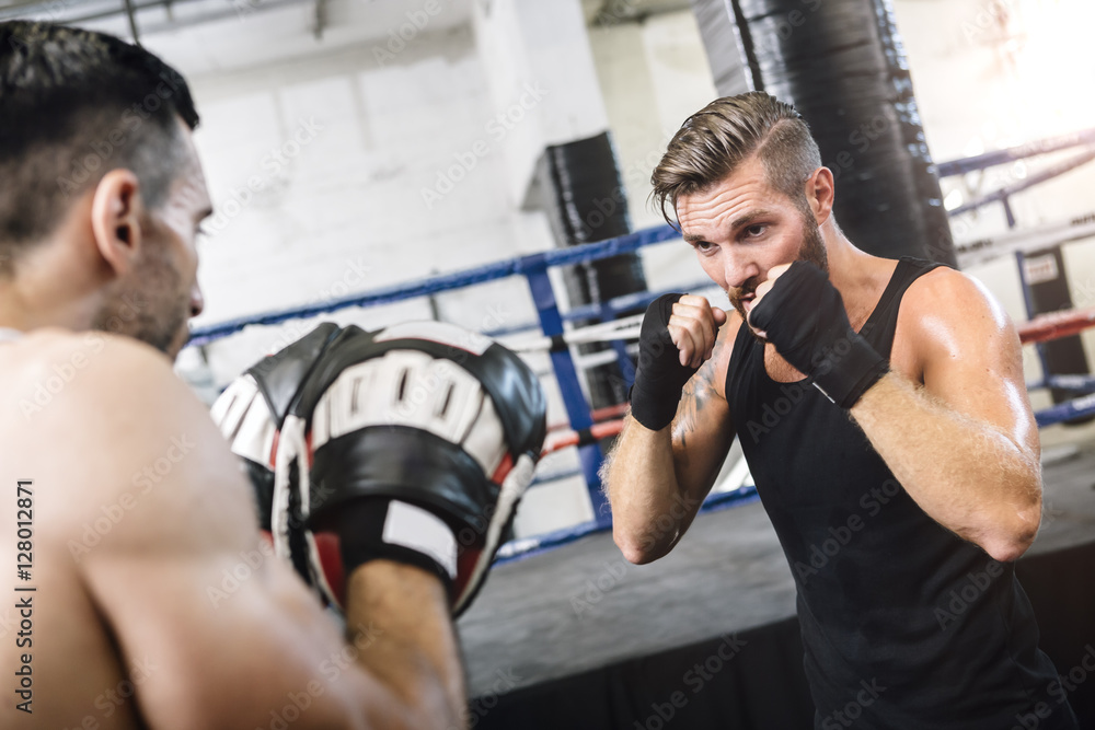 Boxer sparring with coach Boxer sparring with coach