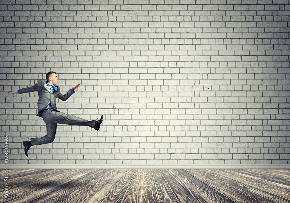 Businessman jumping high Businessman jumping high