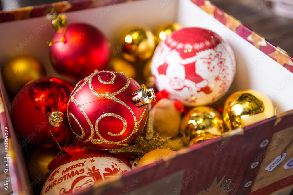 Close up image of a box of Christmas balls ready to be hanged on a Christmas tree.