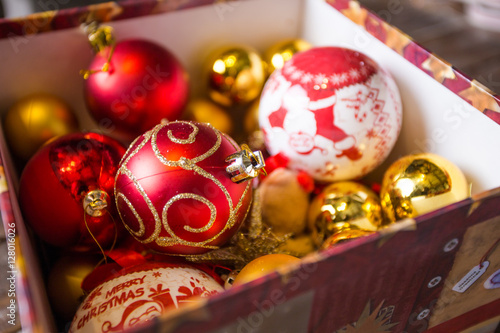 Close up image of a box of Christmas balls ready to be hanged on a Christmas tree. © Dewald