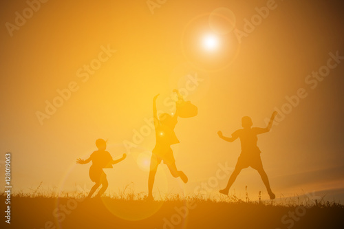 Silhouette of people playing guitar at the sky sunset, happy tim © sawitreelyaon