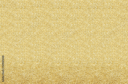 Gold and yellow Christmas Glittering background. Holiday abstrac
