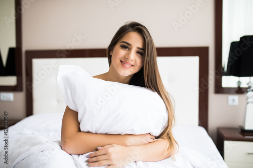Happy girl hug pillow am morning © F8  \ Suport Ukraine