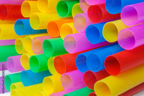 Fotografie Pile of colorful plastic straws - macro image.
