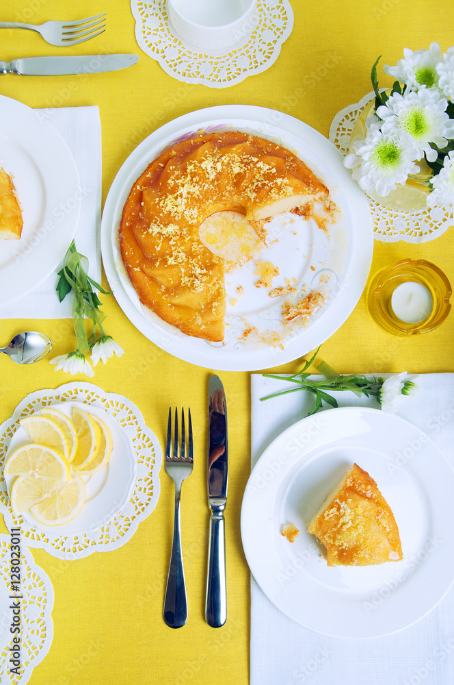 Yellow summer table setting with lemon bundt cake Yellow summer table setting with lemon bundt cake