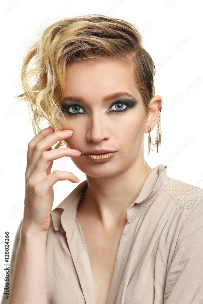 Portrait of a fashion model girl posing on a white background isolated. Portrait of a fashion model girl posing on a white background isolated.