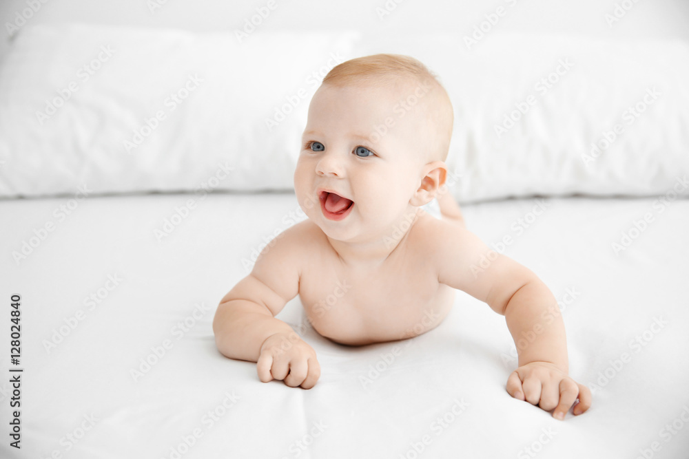 Portrait of little baby on bed Portrait of little baby on bed