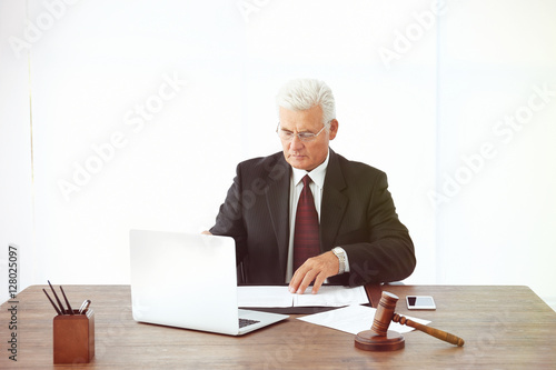 Male judge working with doc...