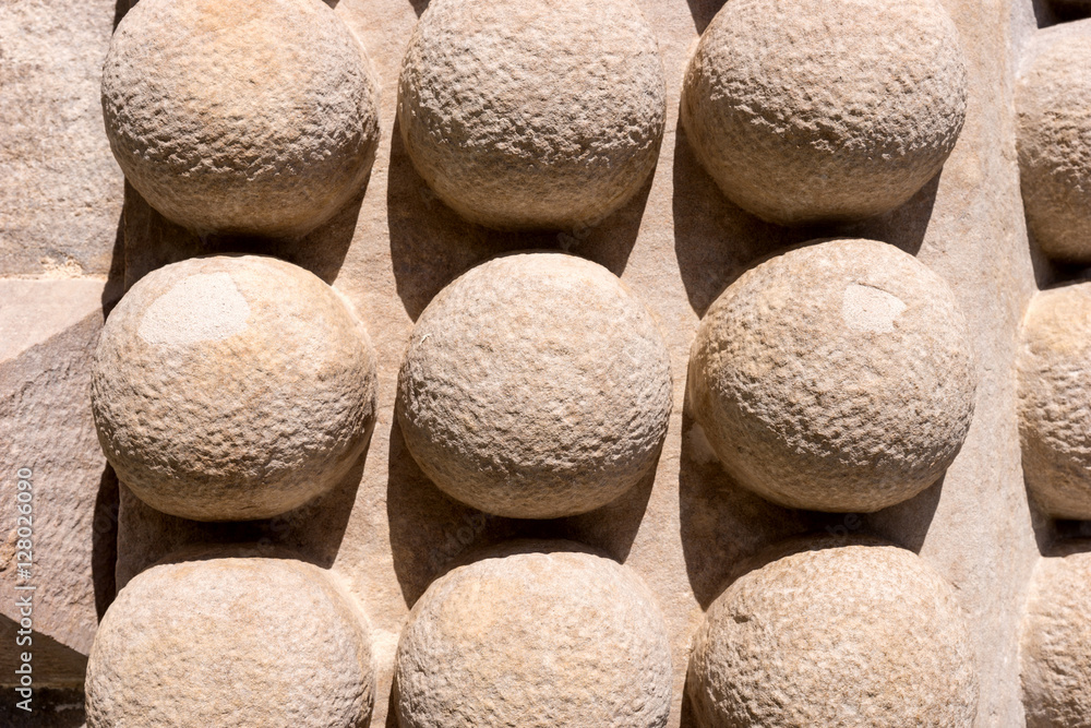 Detail of an old fortified wall with spheres Detail of an old fortified wall with spheres