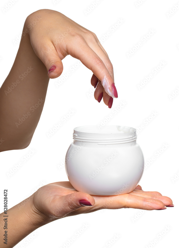Hands with jar cosmetic cream