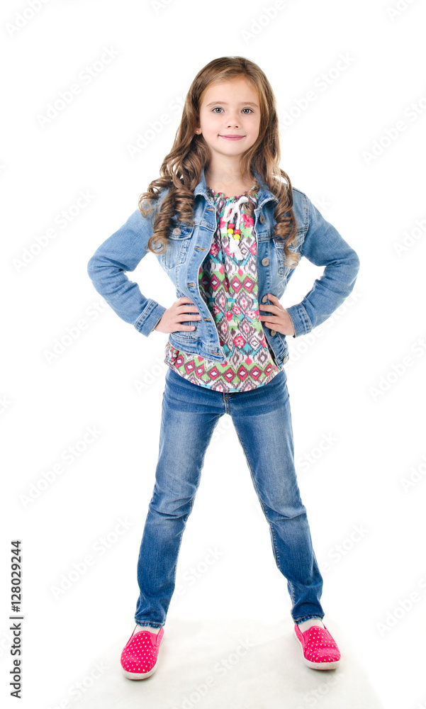 Adorable smiling little girl standing isolated Adorable smiling little girl standing isolated