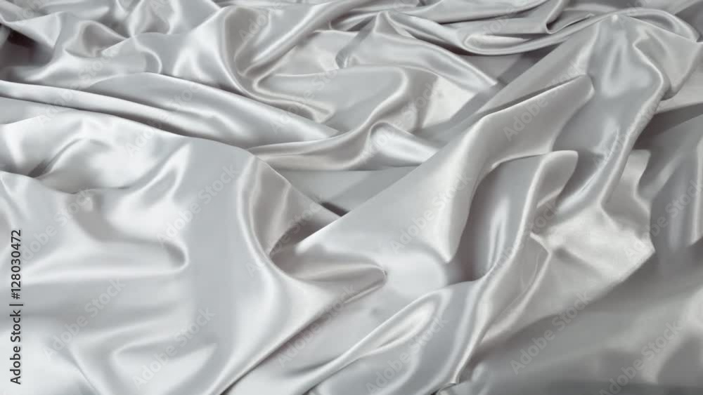 Motion grey backgrounds. Soft crease grey fabric material Motion grey backgrounds. Soft crease grey fabric material