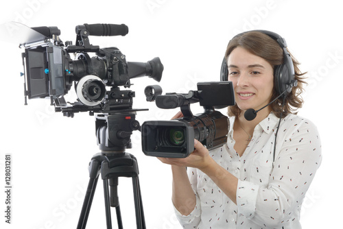 pretty young girl with professional camcorder, on white