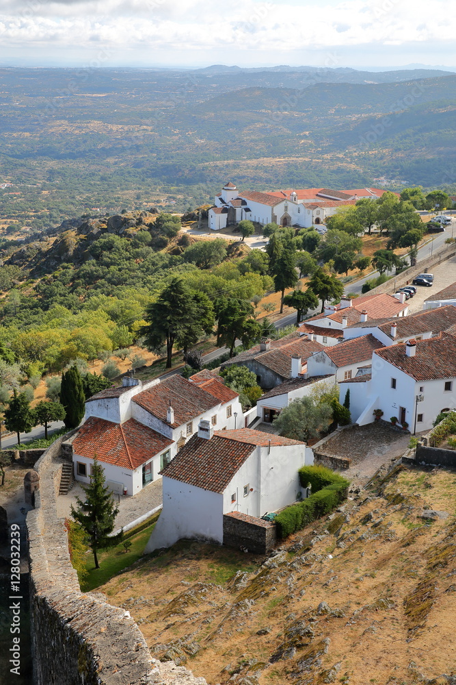 MARVAO, PORTUGAL: View of the fortified village and surrounding hills from the castle