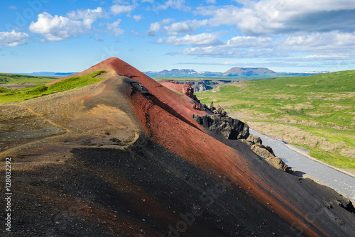 Raudholar, a red volcanic mountain in Iceland photo