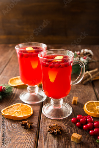 Christmas card. hot spicy Christmas drink of cranberry and spice