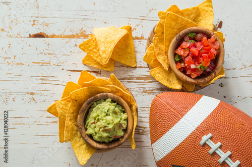 Football party food, super bowl day, nachos salsa guacamole photo