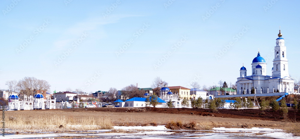 Panoramic views of the park and the white cathedral with blue domes. City Chistopol, Tatarstan, Russia.