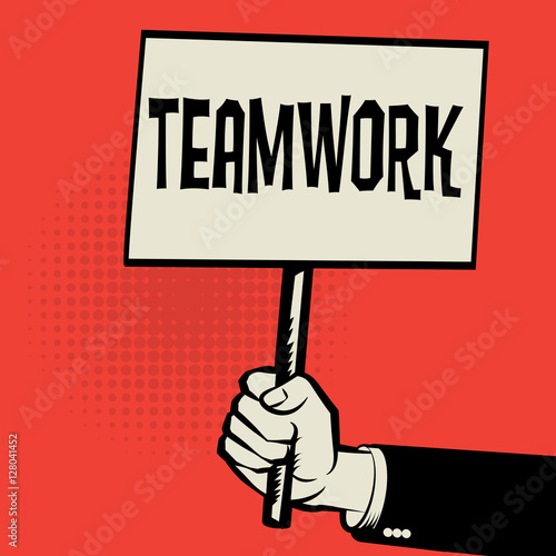 Poster in hand, business concept with text Teamwork