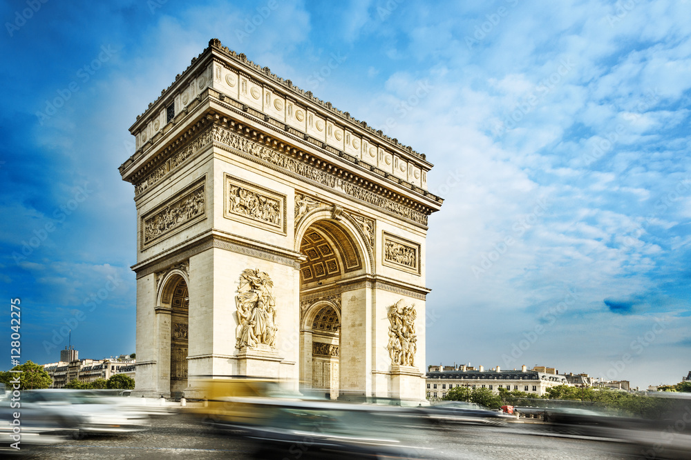 Arc de triomphe, Paris, France, at the blue sky background. Arc de triomphe, Paris, France, at the blue sky background.