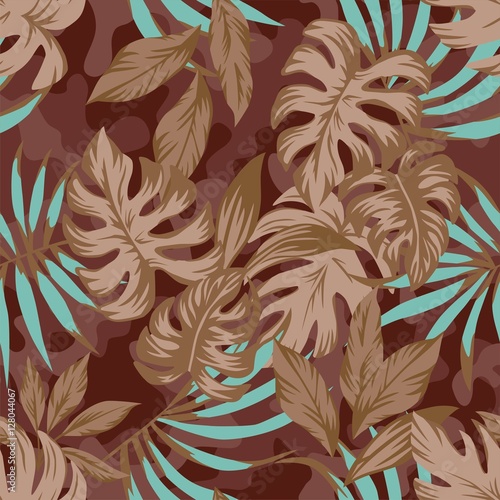 Composition of detailed tropical palm leaves in the jungle. Trendy brown with blue color on the military background. Seamless wallpaper, vector pattern.