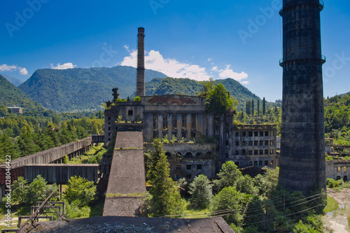 Abandoned, destroyed by war and overgrown Tkvarcheli power plant, Abkhazia, Geor photo